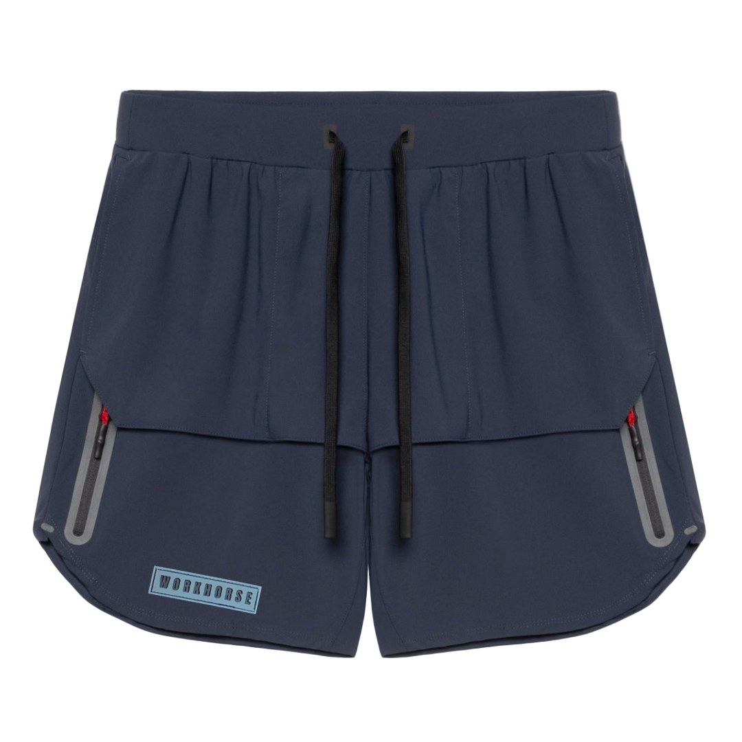 Navy blue athletic shorts with zippers on a white background