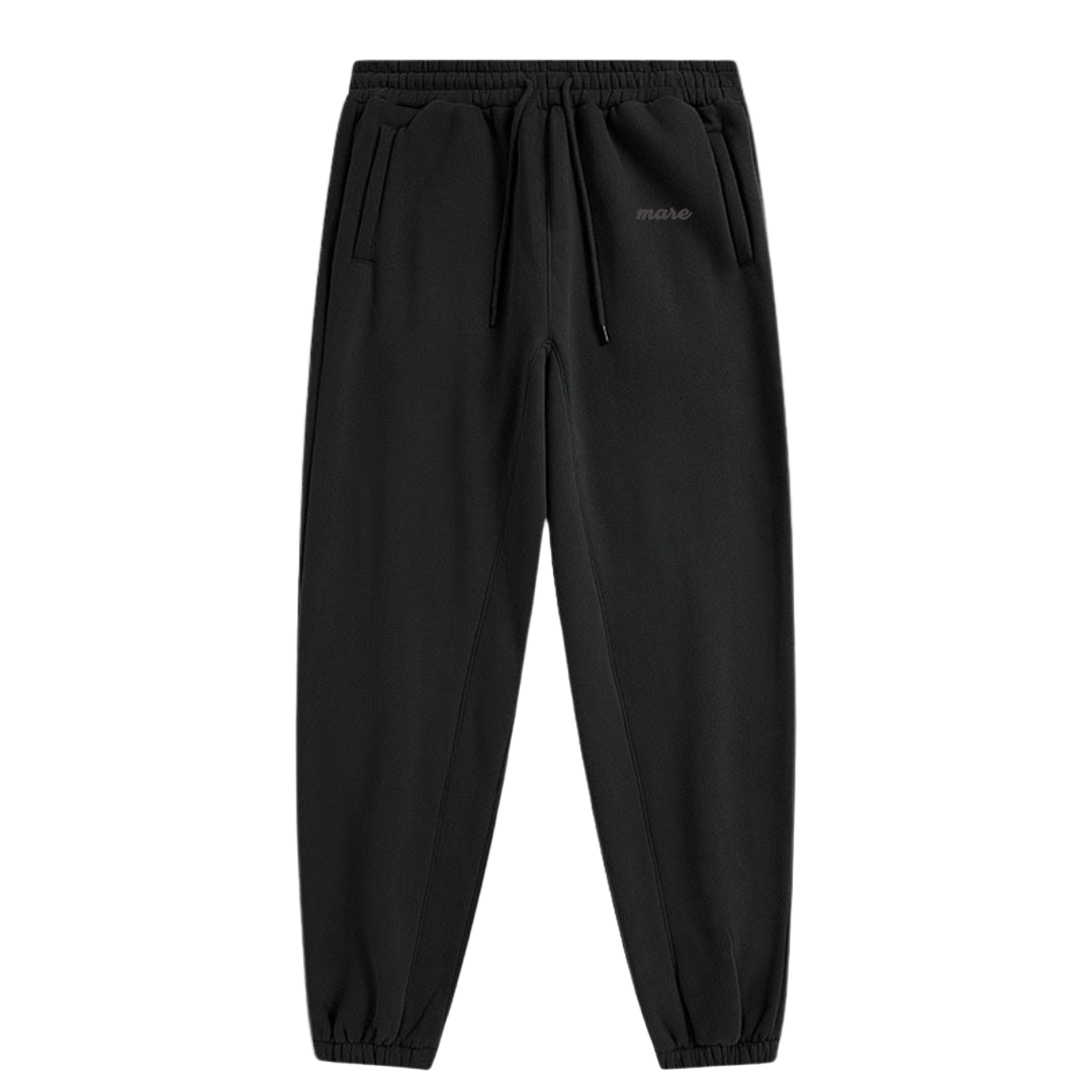 Black pants with a brand logo on a white background