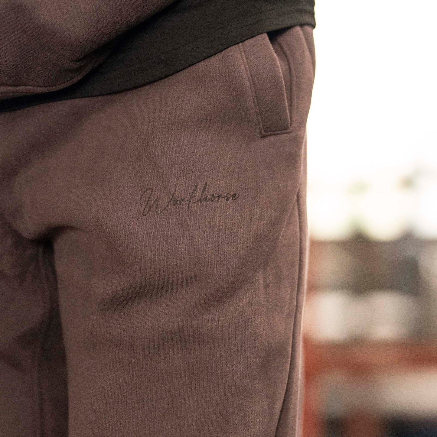 Close up of Workhorse Wide Leg Fleece Pants in color brown.