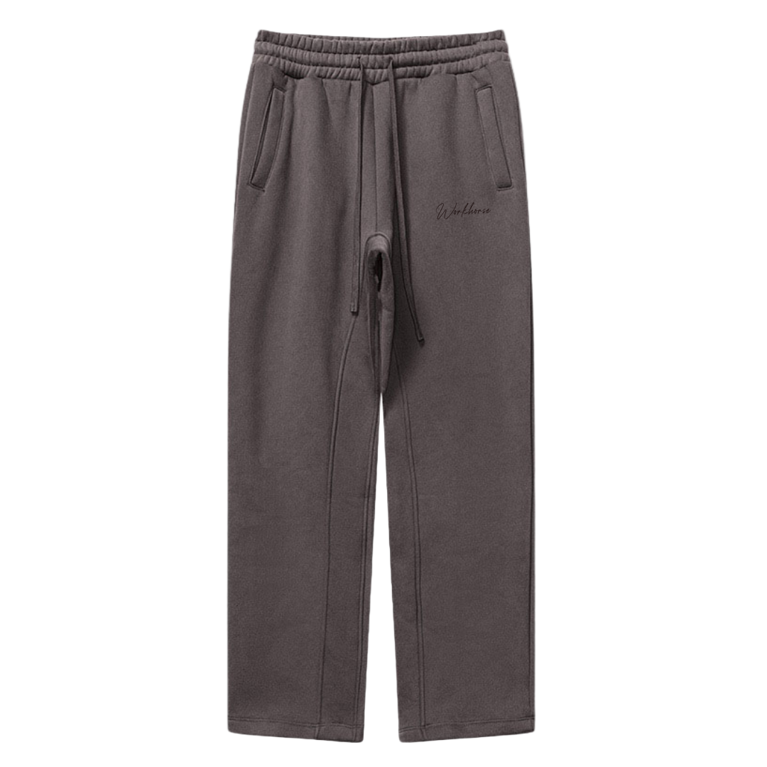 Plum sweatpants with a drawstring on a white background
