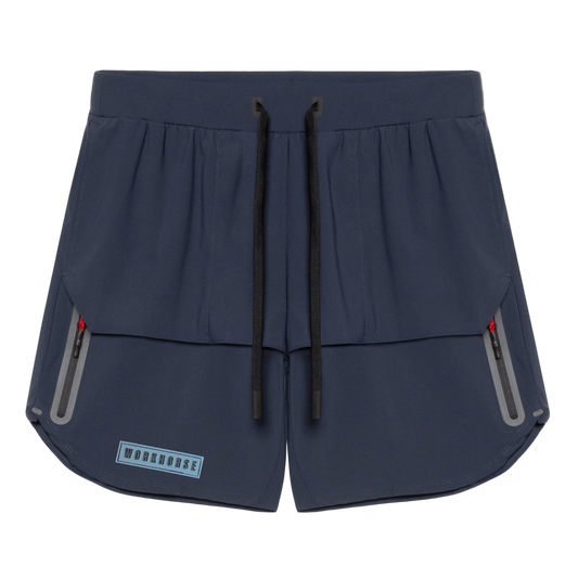 Navy blue athletic shorts with zippers on a white background