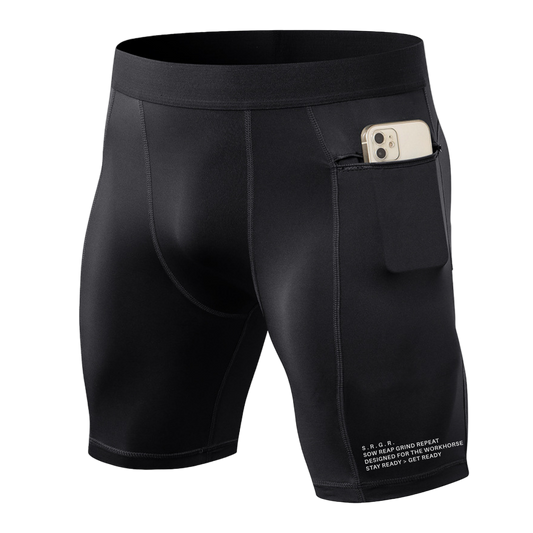 Black athletic shorts with a pocket holding a phone on a white background