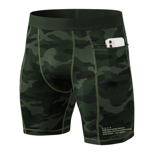 Camouflage shorts with a pocket holding a phone on a white background