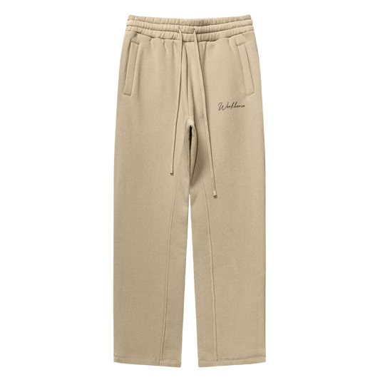 Sand sweatpants with a brand logo on a white background